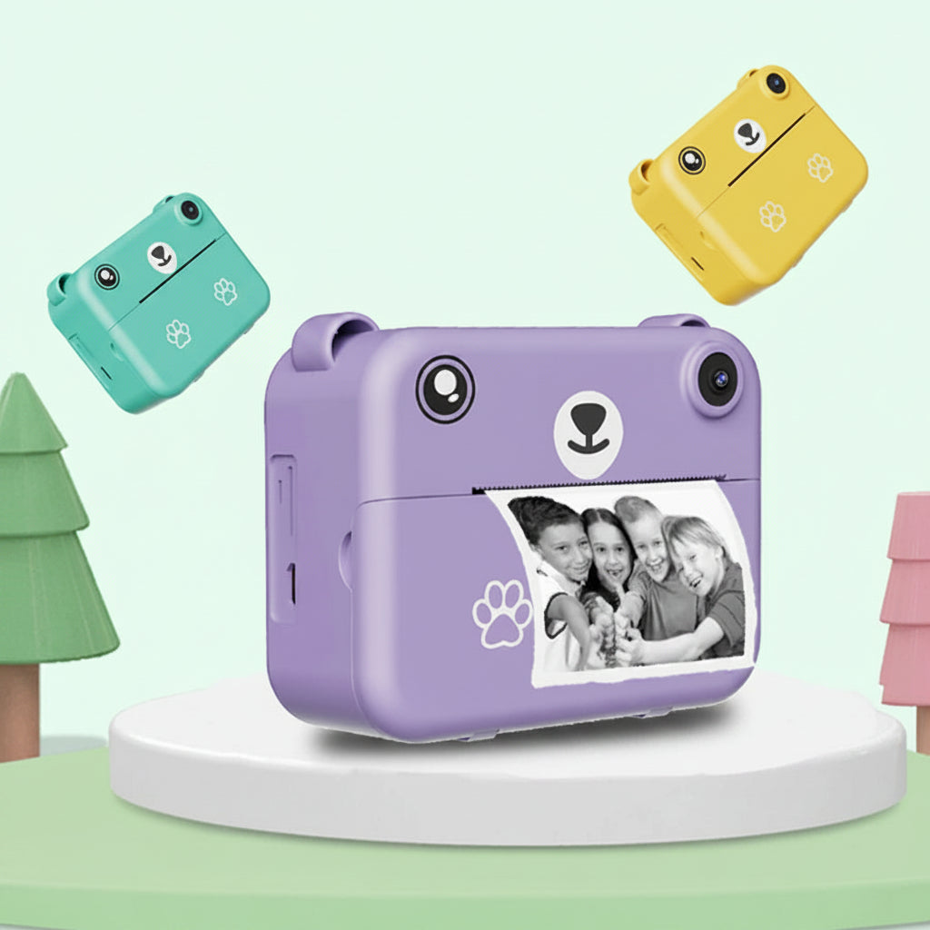 Purple instant print kids camera with bear design, showing a black and white photo.