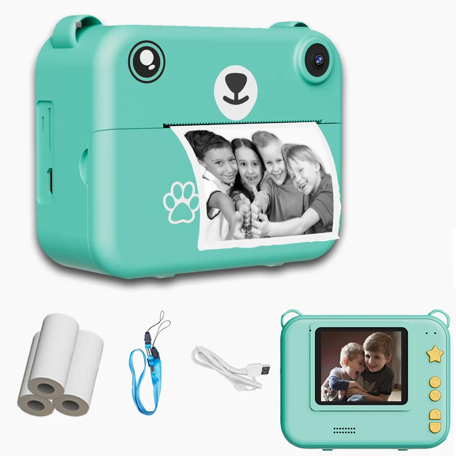 Mint green instant print camera for kids, shaped like a bear, with accessories.