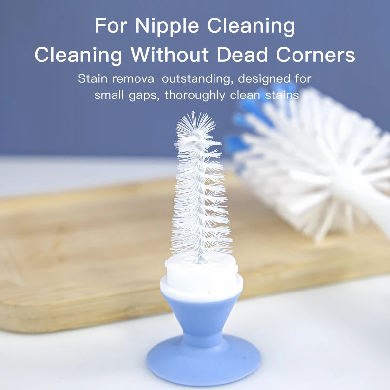 Blue and white 2-in-1 baby bottle and nipple cleaning brush with a vacuum suction base.