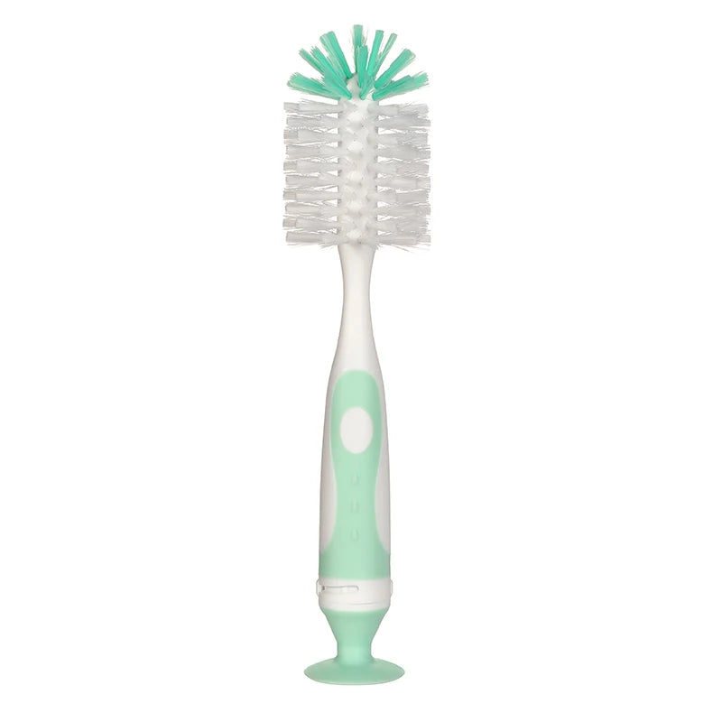 White and mint green 2-in-1 baby bottle and nipple cleaning brush with a vacuum suction base.