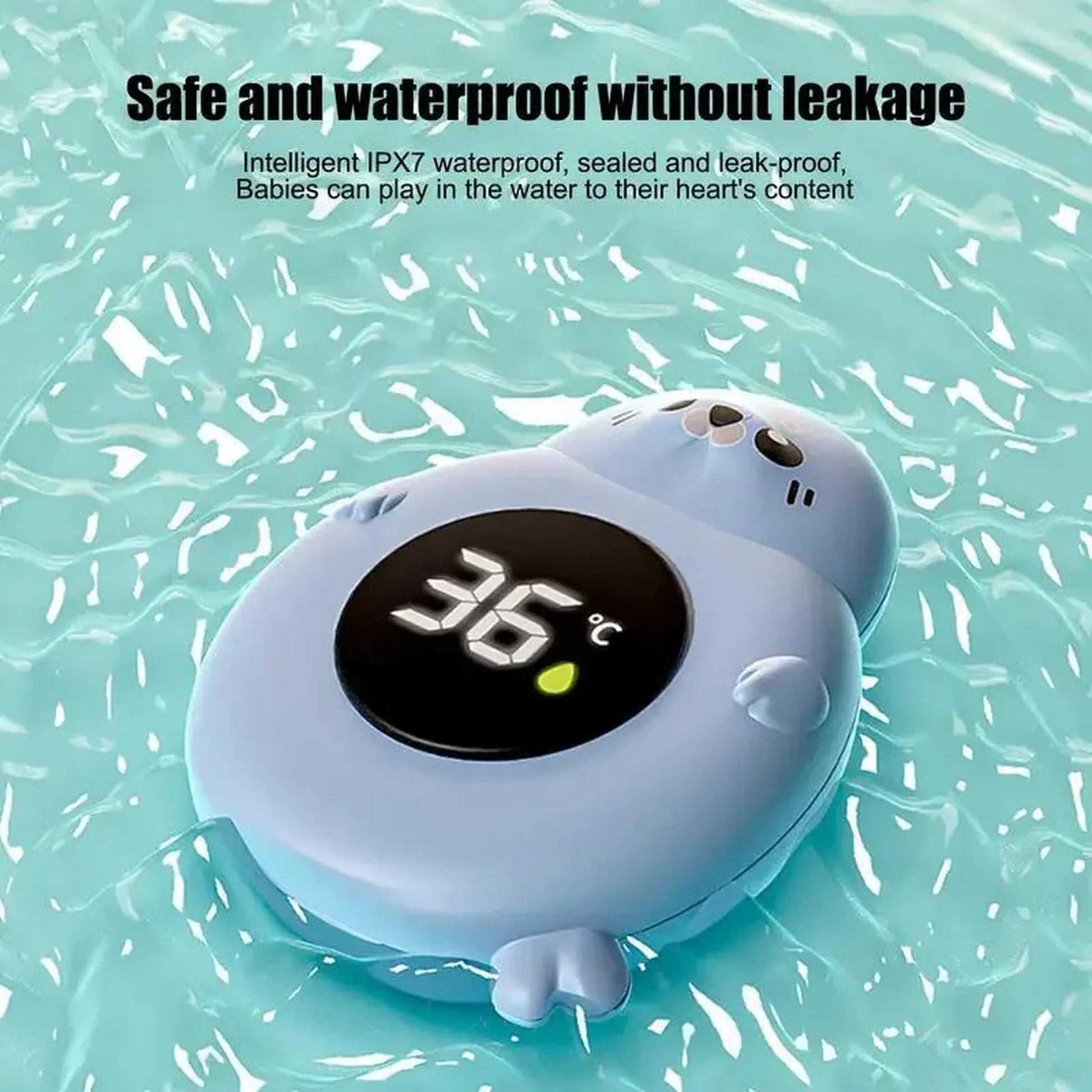 Cute blue seal-shaped digital baby bath thermometer floating in water, displaying 36°C.