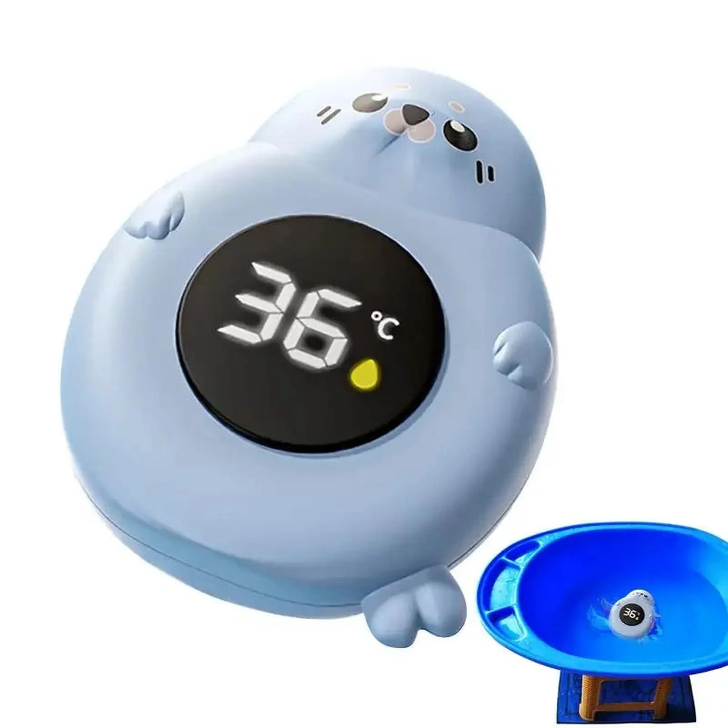 Cute blue seal-shaped digital baby bath thermometer displaying 36°C, shown with a blue baby tub.