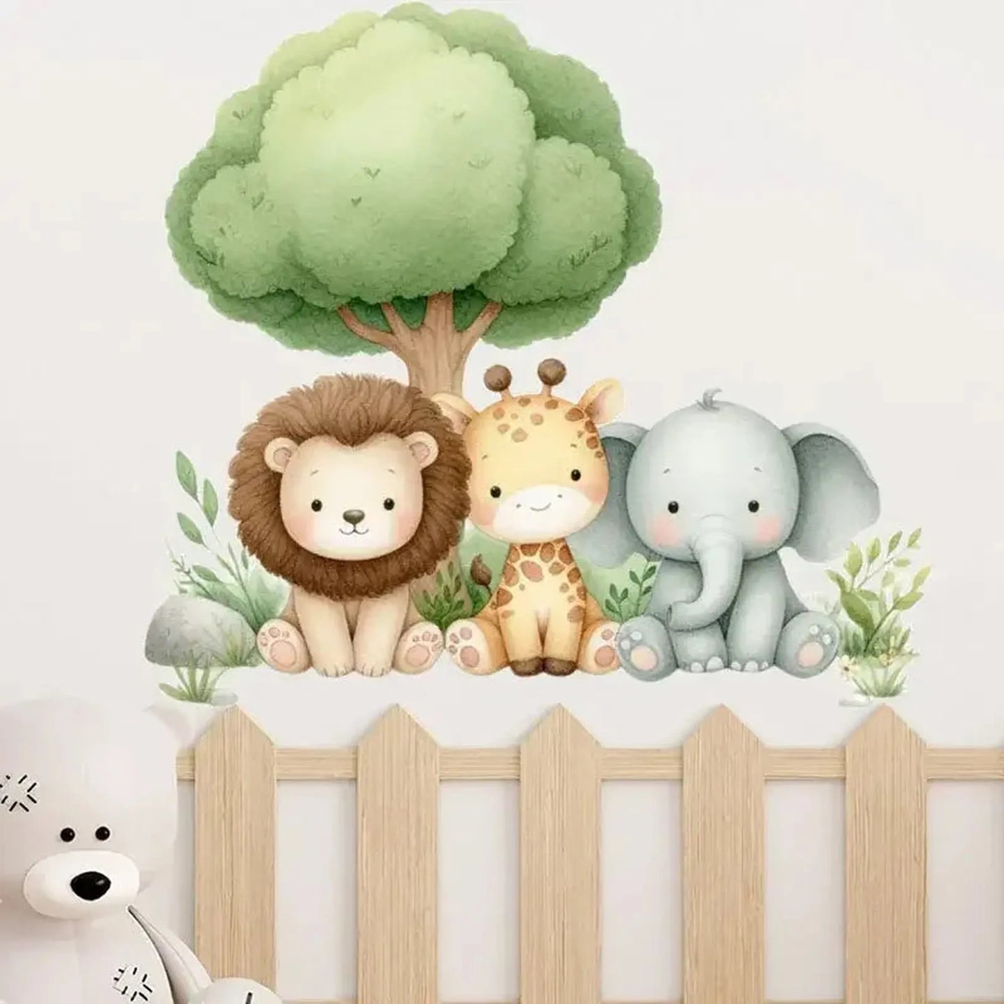 Cute watercolor jungle animal wall decals: lion, giraffe, elephant, and green tree for nursery decor.