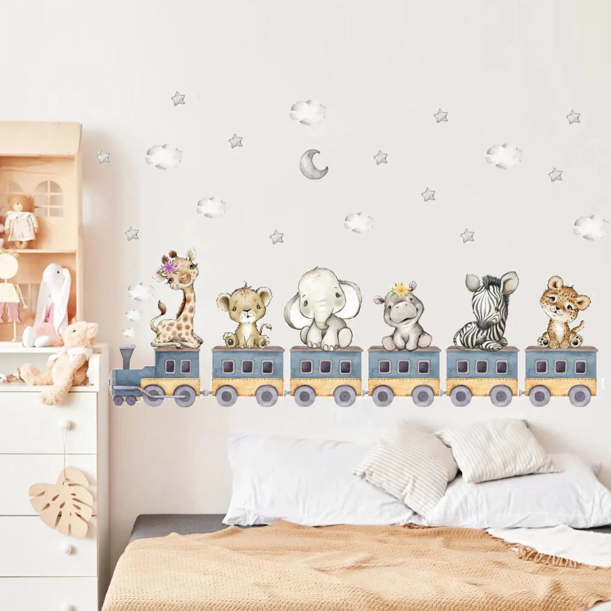Watercolor safari animal train wall decals with clouds and stars for a baby's room.