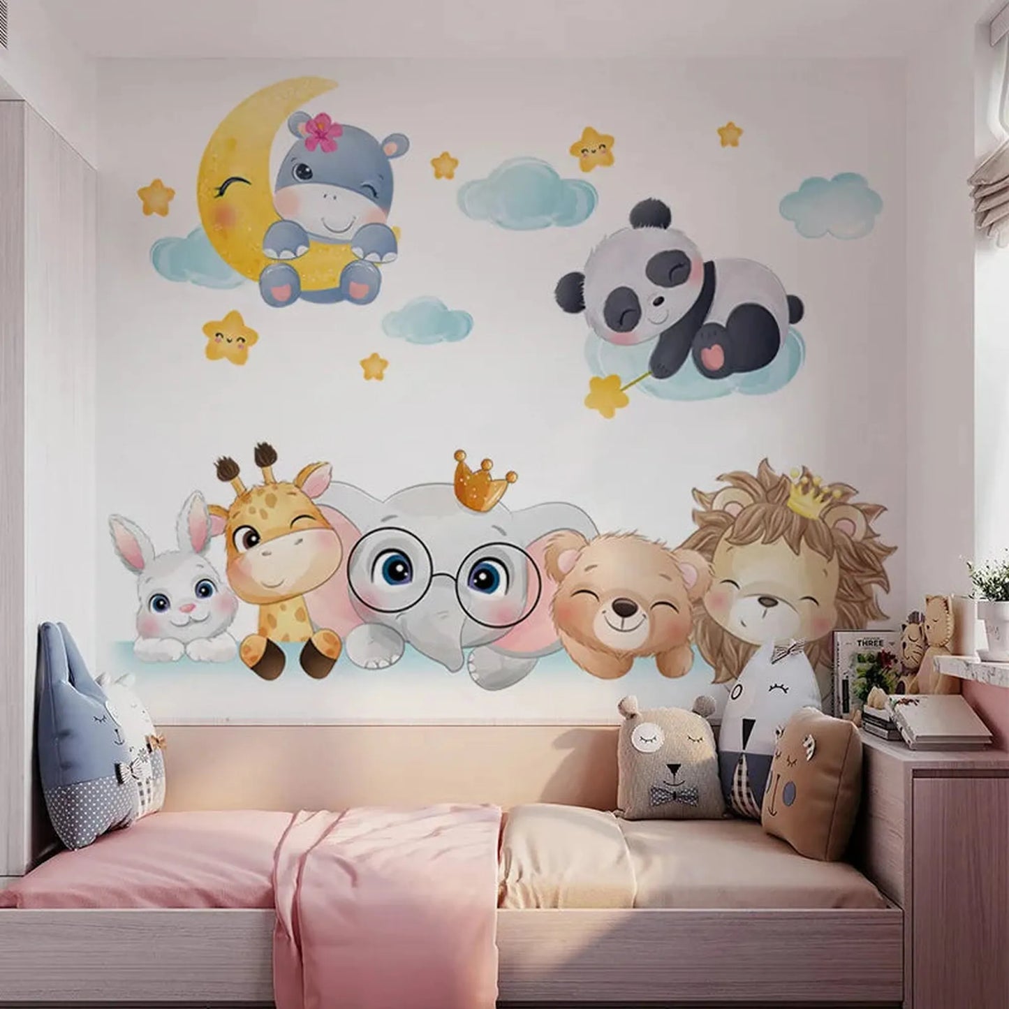 Colorful PVC forest animal wall decals for a baby's nursery, featuring a hippo on a moon, sleeping panda, and a row of cute animals.