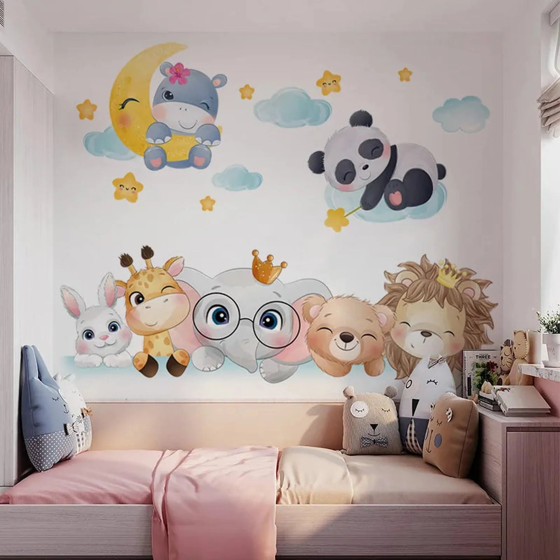 Colorful PVC forest animal wall decals for a baby's nursery, featuring a hippo on a moon, sleeping panda, and a row of cute animals.