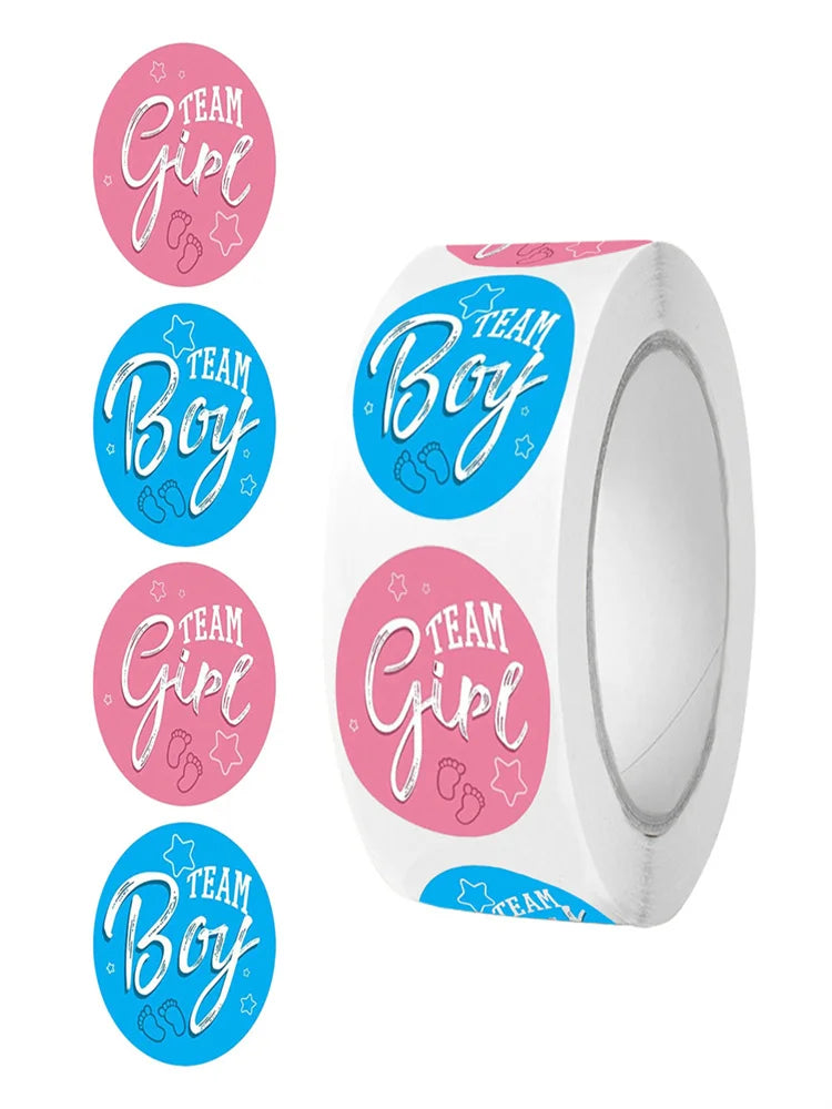 Pink "Team Girl" and blue "Team Boy" round vinyl stickers on a roll for gender reveal parties.