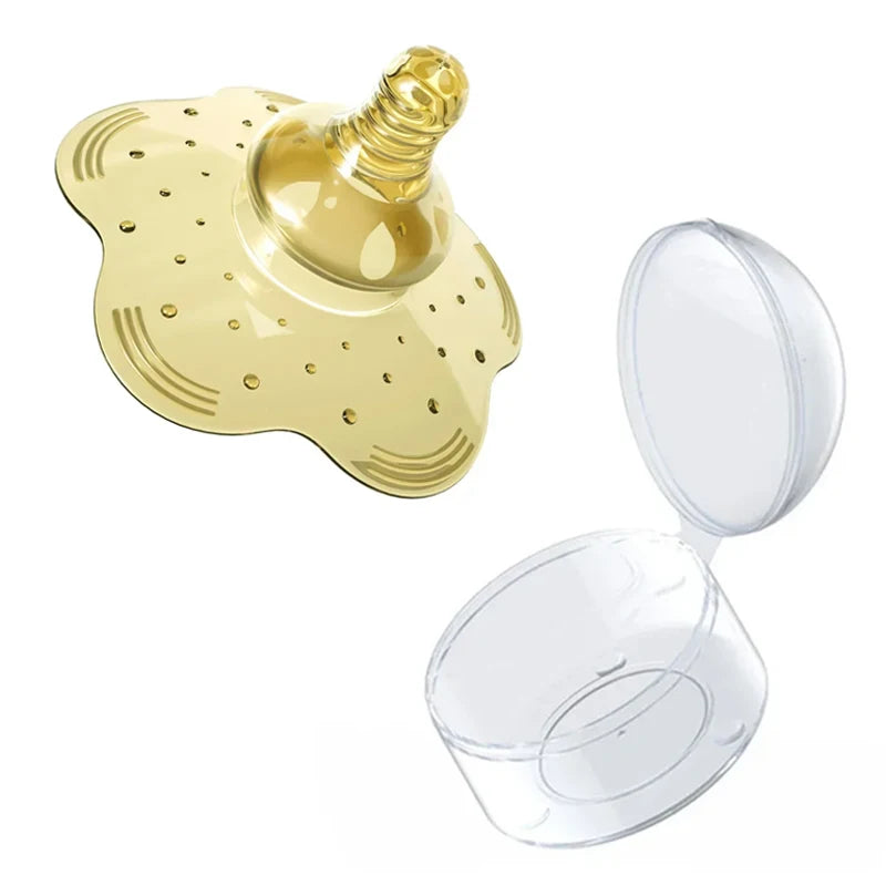 Soft yellow silicone nipple shield with a clear protective case.
