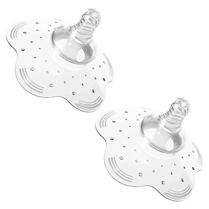 Two clear, soft silicone nipple shields for comfortable breastfeeding, featuring a natural shape and small holes.