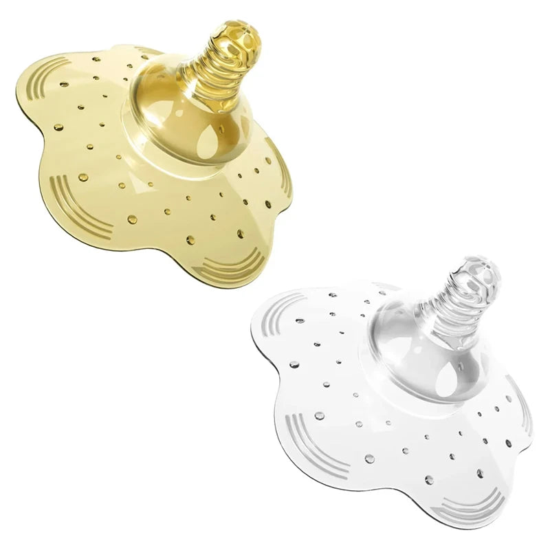 Two soft silicone nipple shields, one clear and one amber, with a natural design for comfortable breastfeeding.