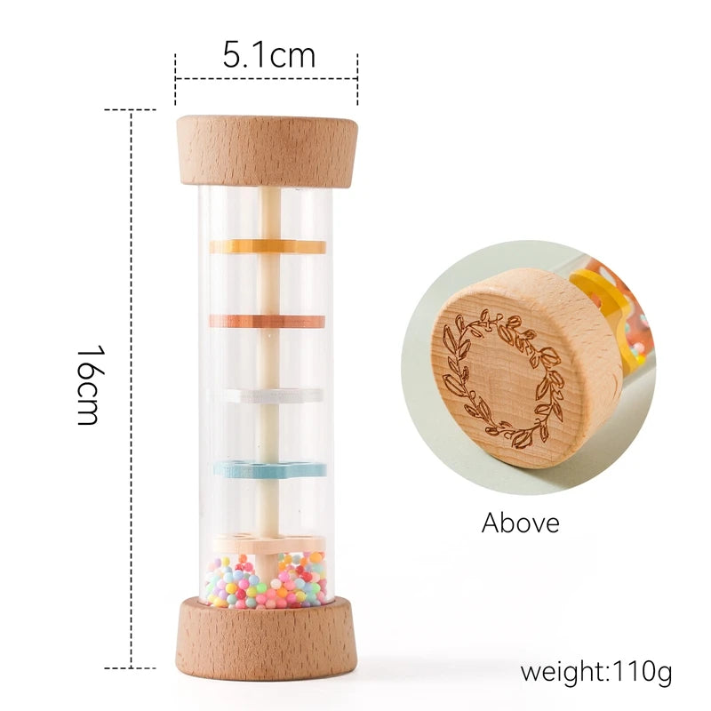 Montessori rainbow rain stick rattle for babies, clear tube with colorful beads and wooden ends.