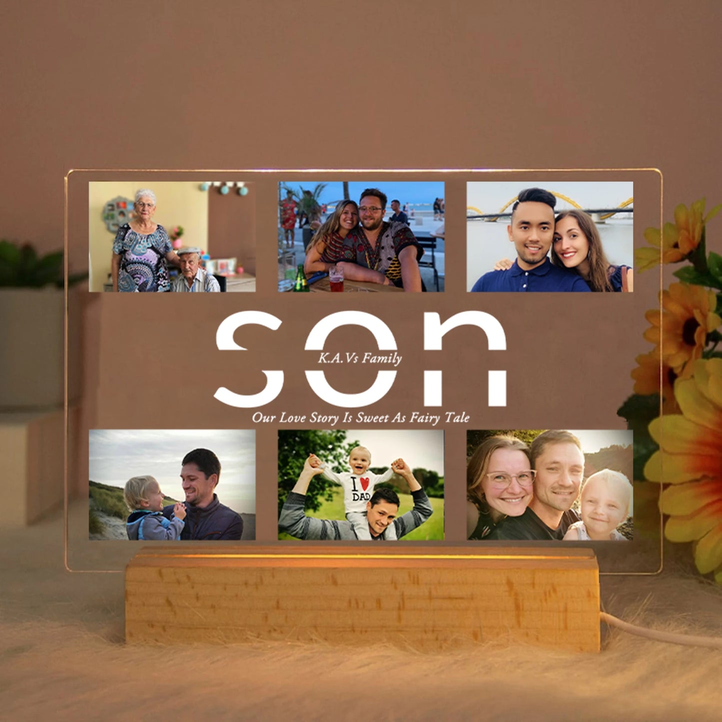 Personalized acrylic LED night light with family photos, "son" text, and a wooden base.