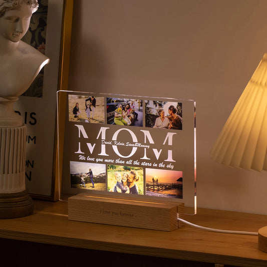 Personalized acrylic LED night light with "MOM" text, custom photos, and a wooden base.