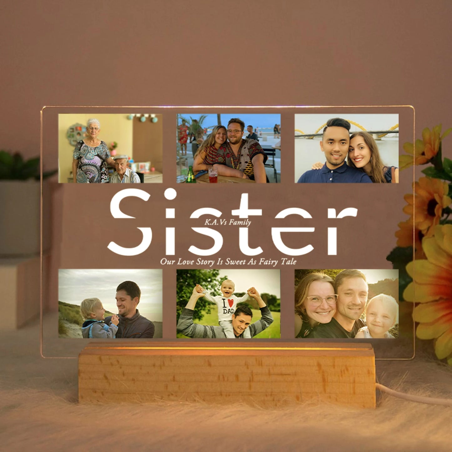 Personalized acrylic LED night light with "Sister" text, custom photos, and a warm wooden base.