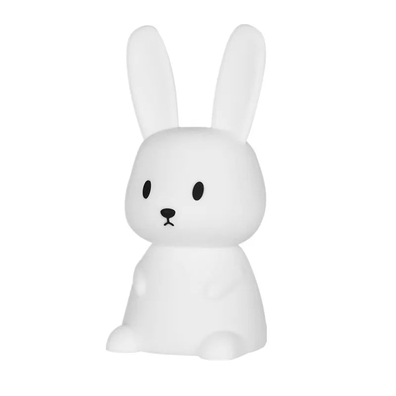 White silicone rabbit night light with touch sensor for kids' room.