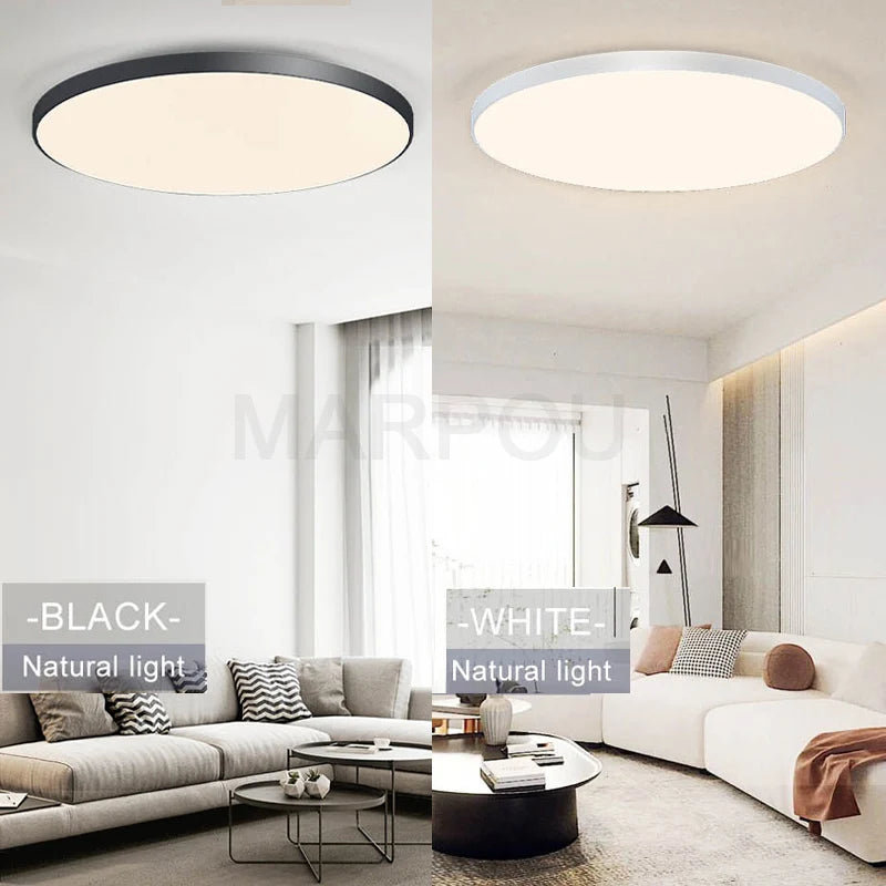 Modern round LED smart ceiling light in black and white, providing natural light for living rooms.