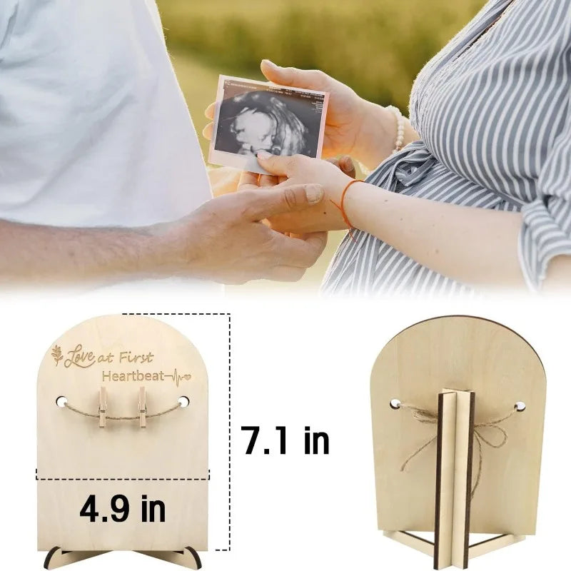 Wooden ultrasound photo frame, "Love at First Heartbeat" engraving, with mini clothespins and twine, 7.1 inches tall.
