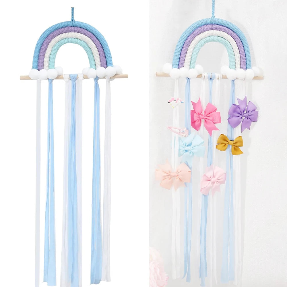 Braided cotton rainbow wall hanger with pom-poms and ribbons for girls' hair accessories.