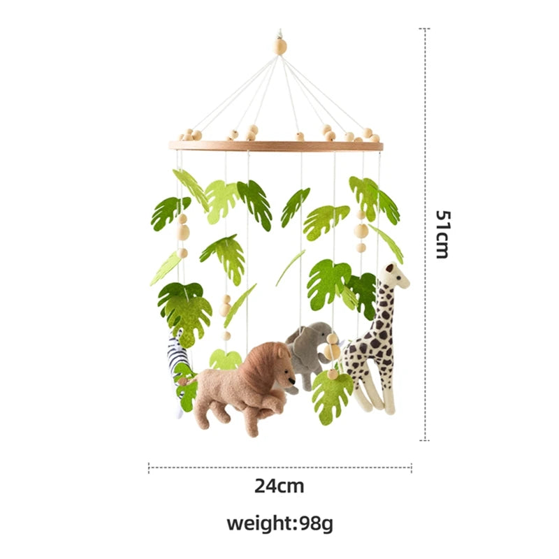Wooden crib mobile with felt jungle animals and green leaves.