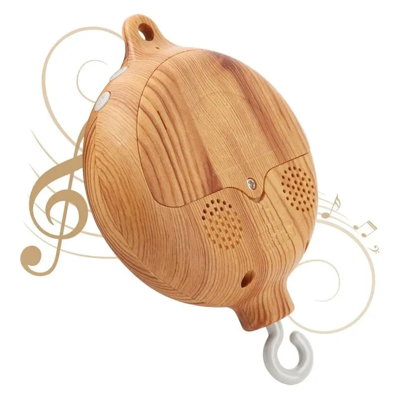 Wooden musical crib mobile with Nordic design, natural wood grain, and speaker holes.