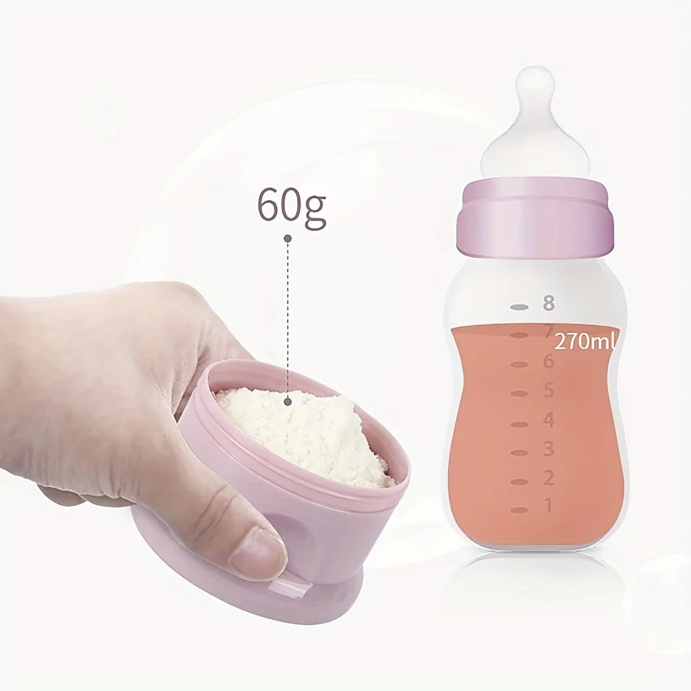 Pink modular baby formula dispenser with 60g powder, next to a pink baby bottle with 270ml liquid.