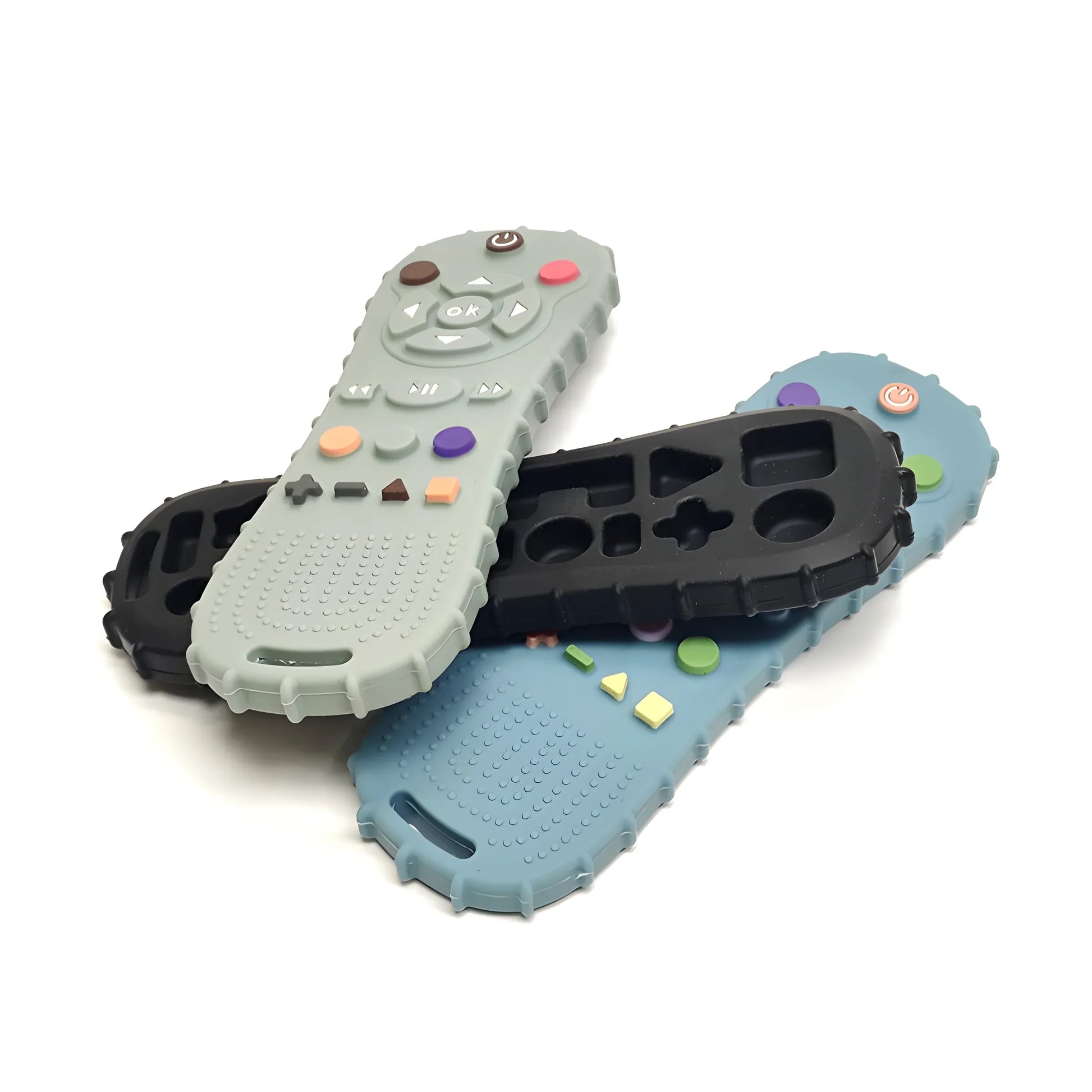 Three silicone baby teethers shaped like remote controls in gray, blue, and black with colorful buttons.