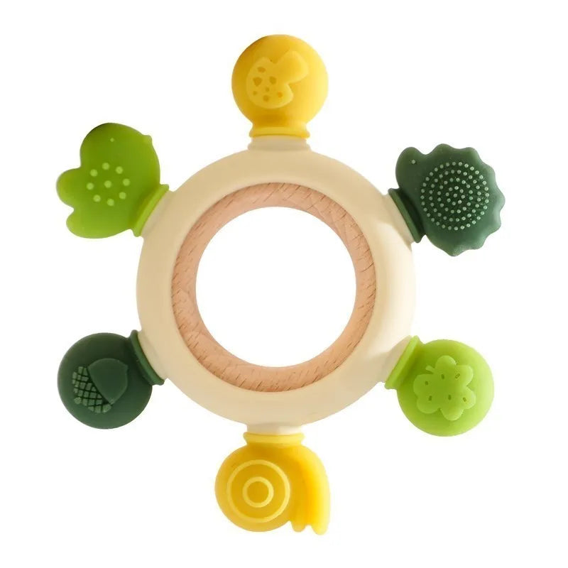 Montessori forest-themed baby teether with a wooden ring, green and yellow silicone forest animal shapes.