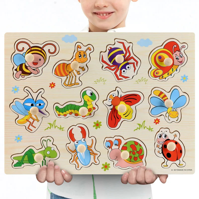 Wooden Montessori puzzle with colorful insect shapes and pegs, held by a child.