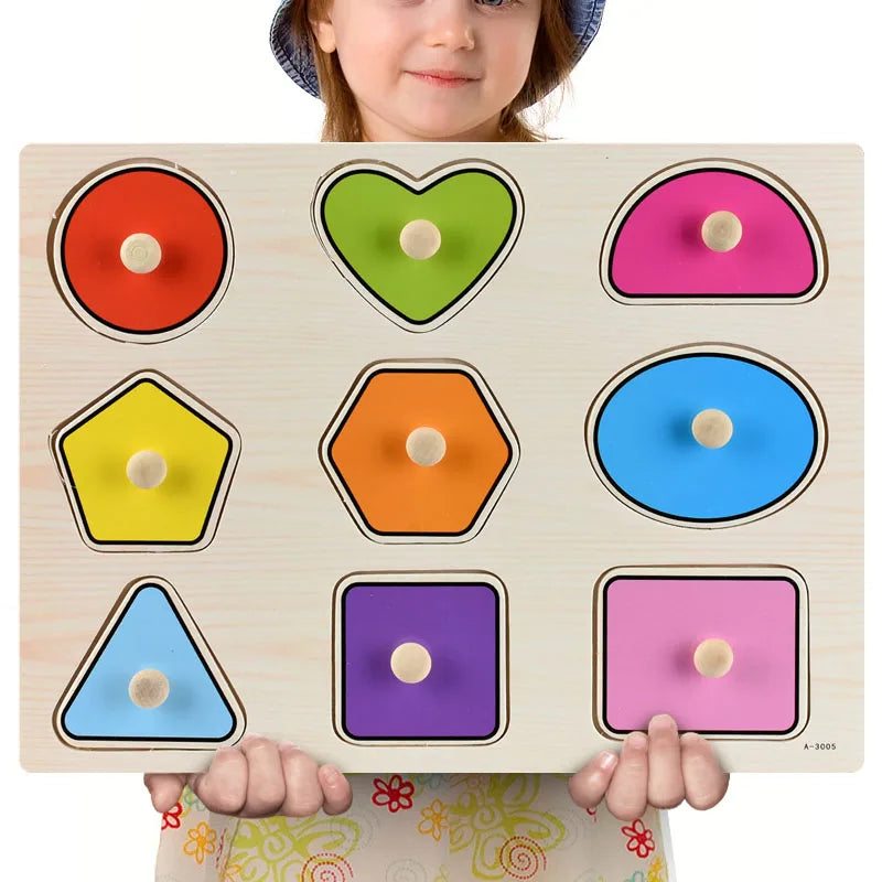 Child holding a wooden Montessori puzzle with nine colorful geometric shapes and knobs.