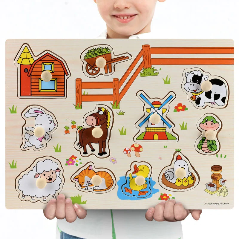 Wooden Montessori farm animal and object puzzle with colorful pieces held by a child.