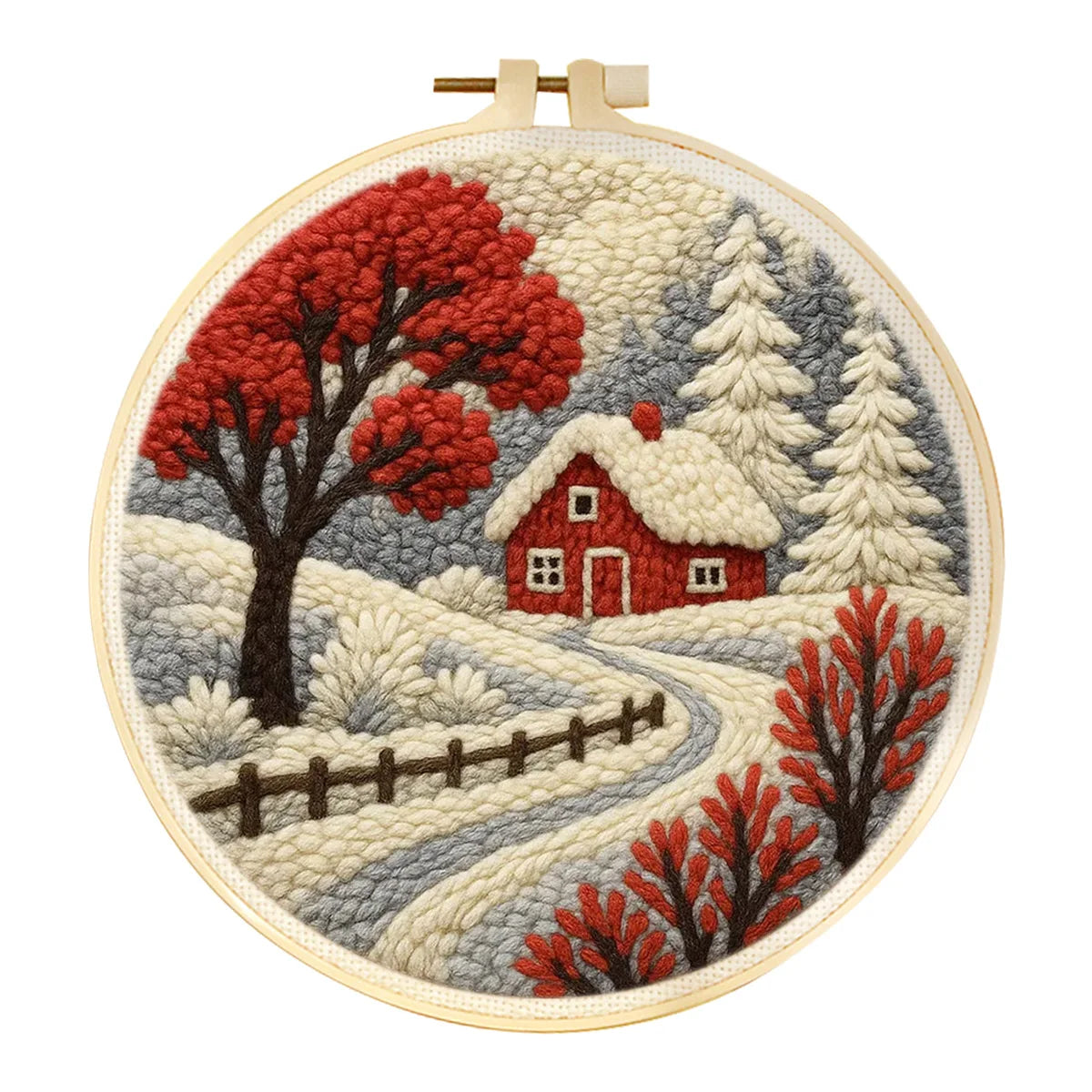 Punch needle embroidery kit with a red house, snowy winter landscape, and red trees in a wooden hoop.
