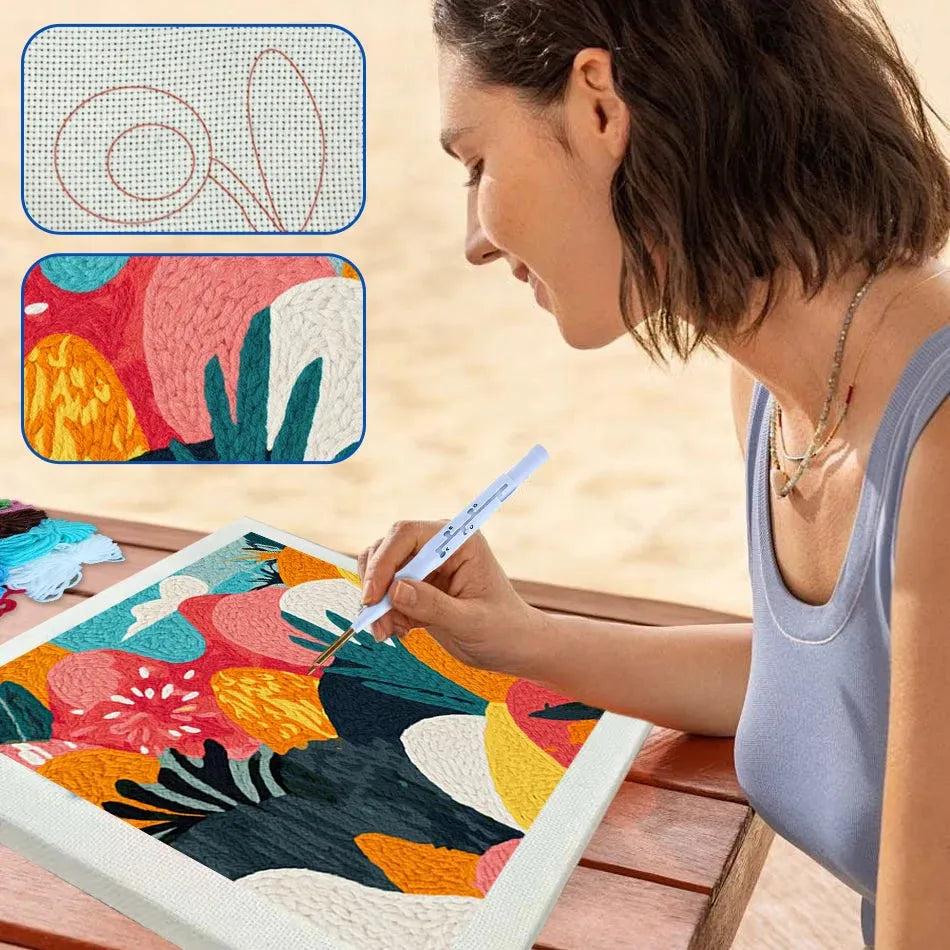 Woman using a punch needle kit to create a colorful abstract floral design on a framed canvas.