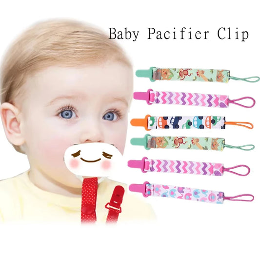 Set of 3 colorful polyester baby pacifier clips with plastic clasps, featuring cute animal, car, and zigzag patterns.