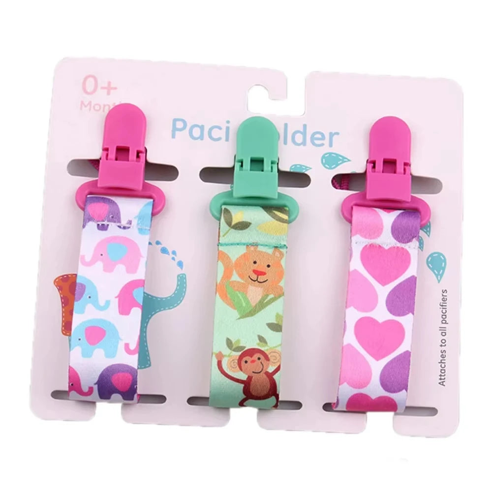Set of 3 colorful polyester pacifier clips with plastic clasps, featuring elephant, jungle animal, and heart patterns.