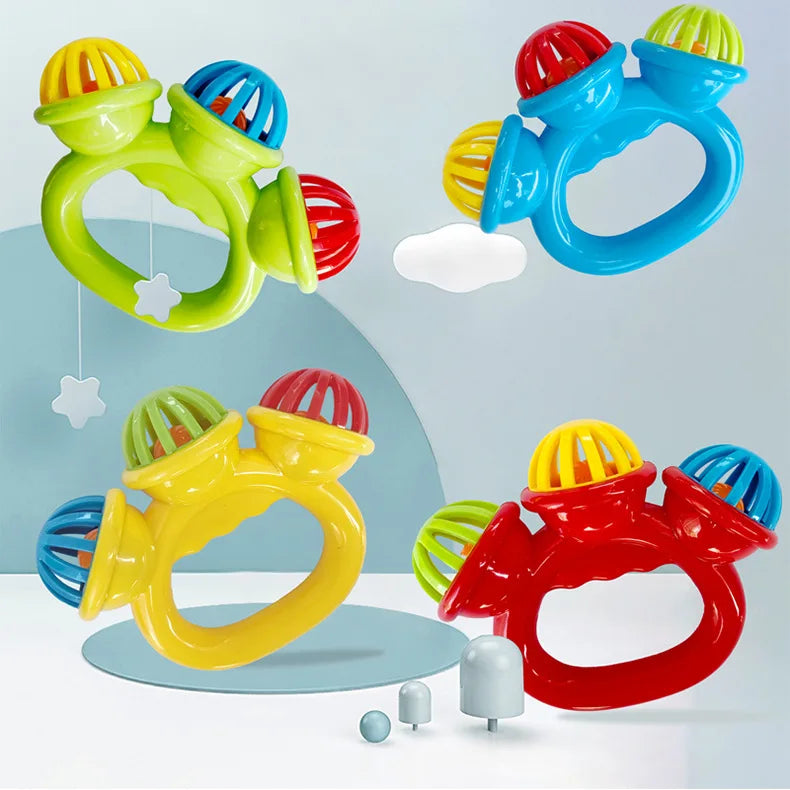 Set of four colorful baby rattles in green, blue, yellow, and red with multi-colored bells.