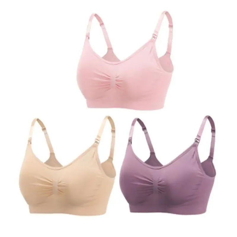 Set of 3 seamless, breathable maternity and nursing bras in pink, beige, and purple with front clips.