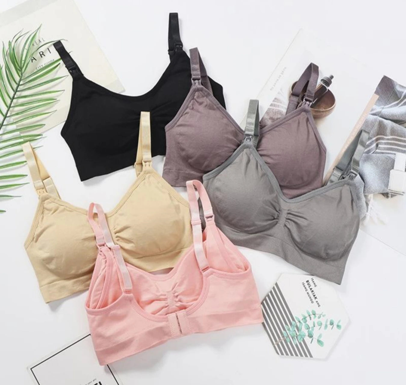 Set of 5 seamless, breathable nursing and maternity bras in black, beige, pink, and two shades of grey.