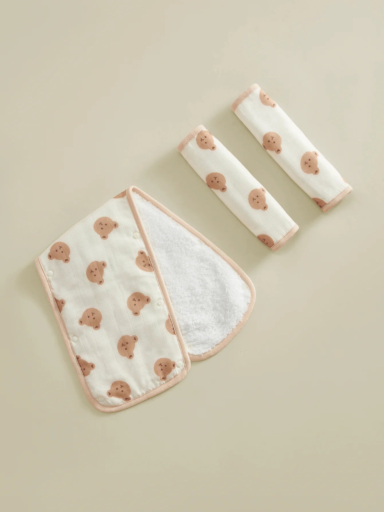 Soft white stroller handle cover and two safety belt pads with cute brown bear print.