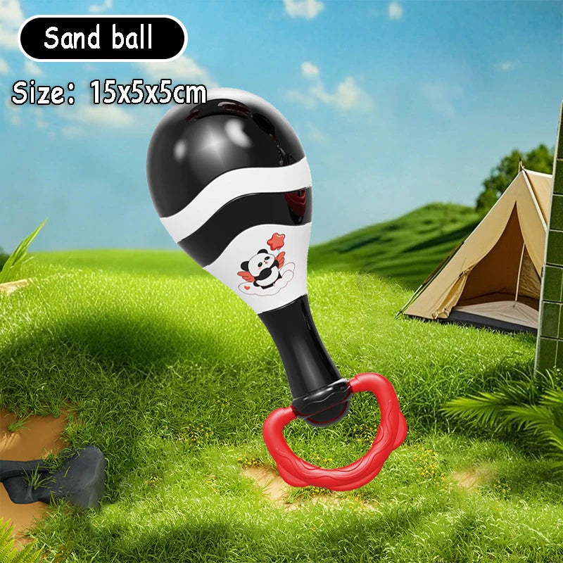 Black and white Montessori musical rattle with a panda design and red teether handle, 15x5x5cm.