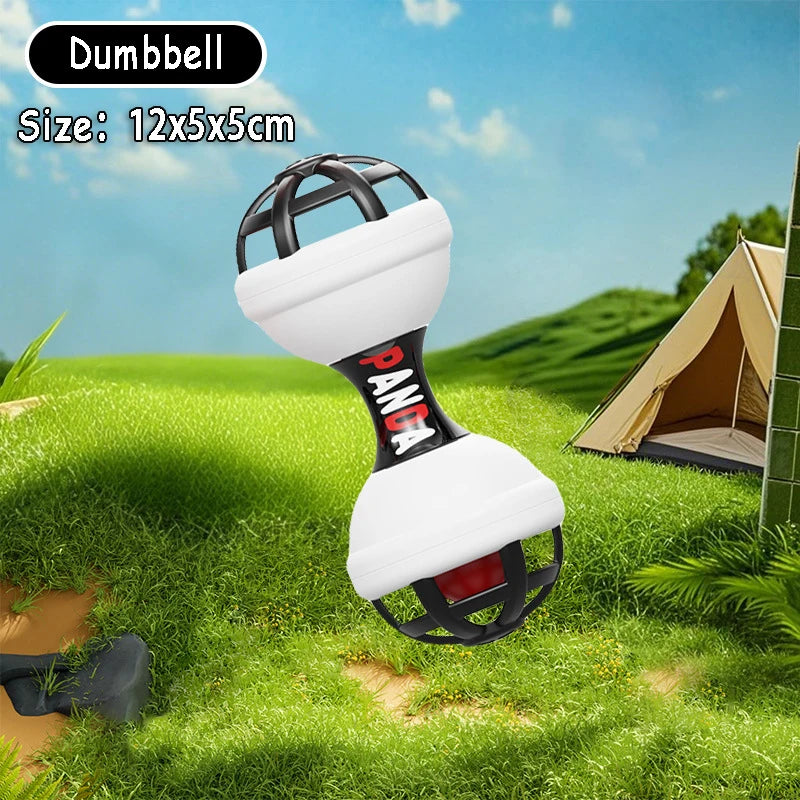 White and black dumbbell-shaped baby rattle with "PANDA" text, 12x5x5cm, on grass.