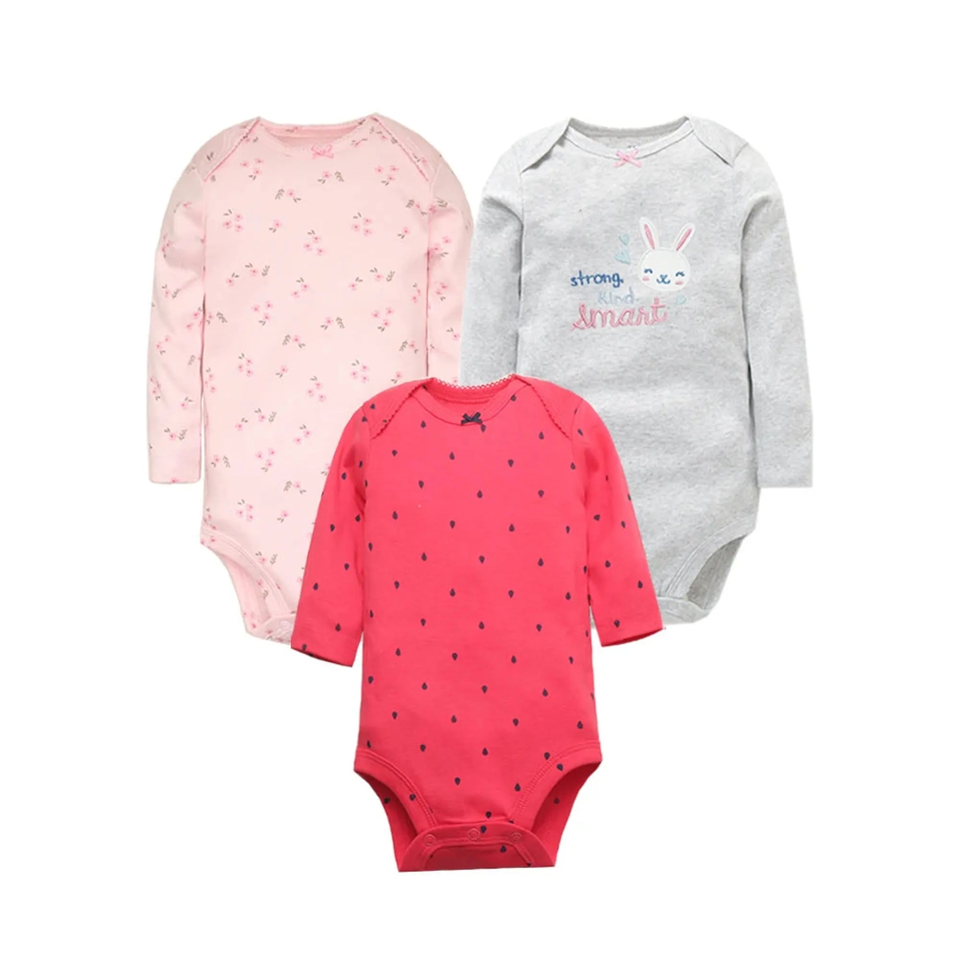 Three long-sleeve cotton baby bodysuits: pink floral, gray with bunny graphic, and red with tiny black dots.