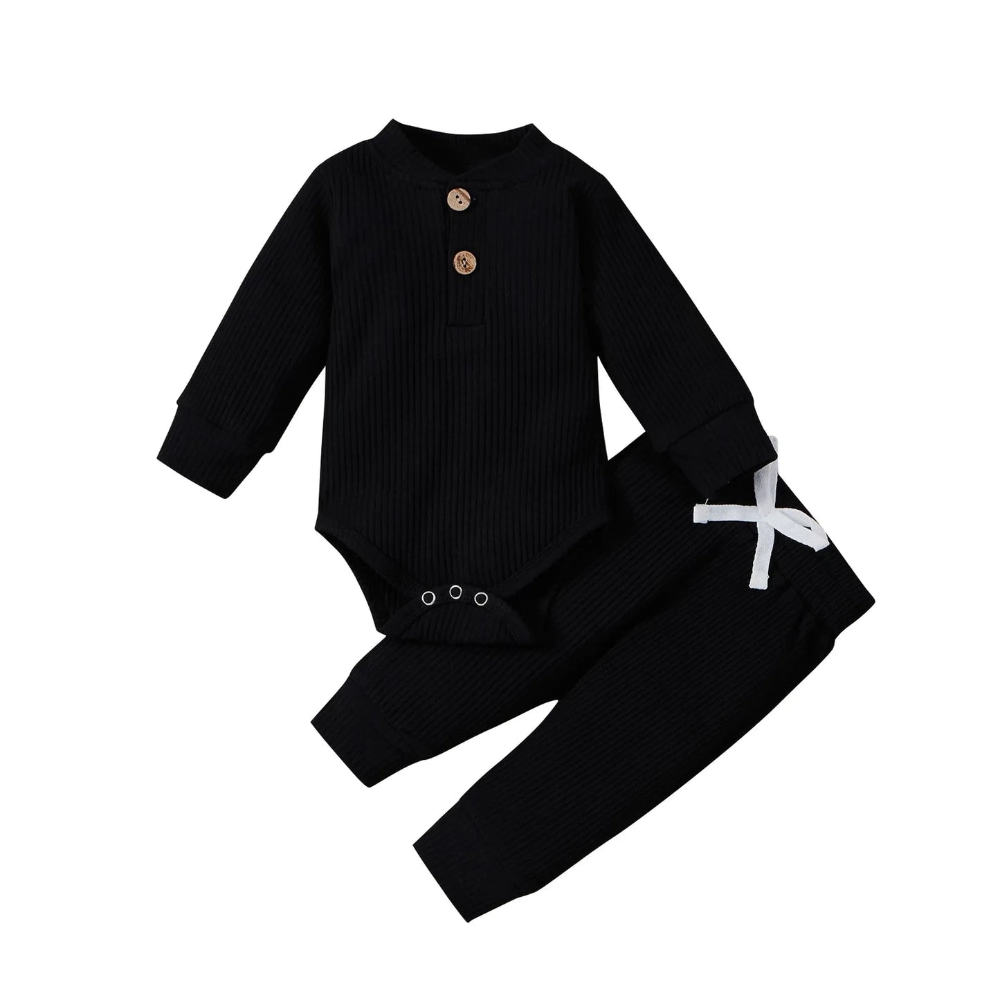 Black ribbed cotton long-sleeve baby bodysuit with wooden buttons and matching pants with white drawstring.