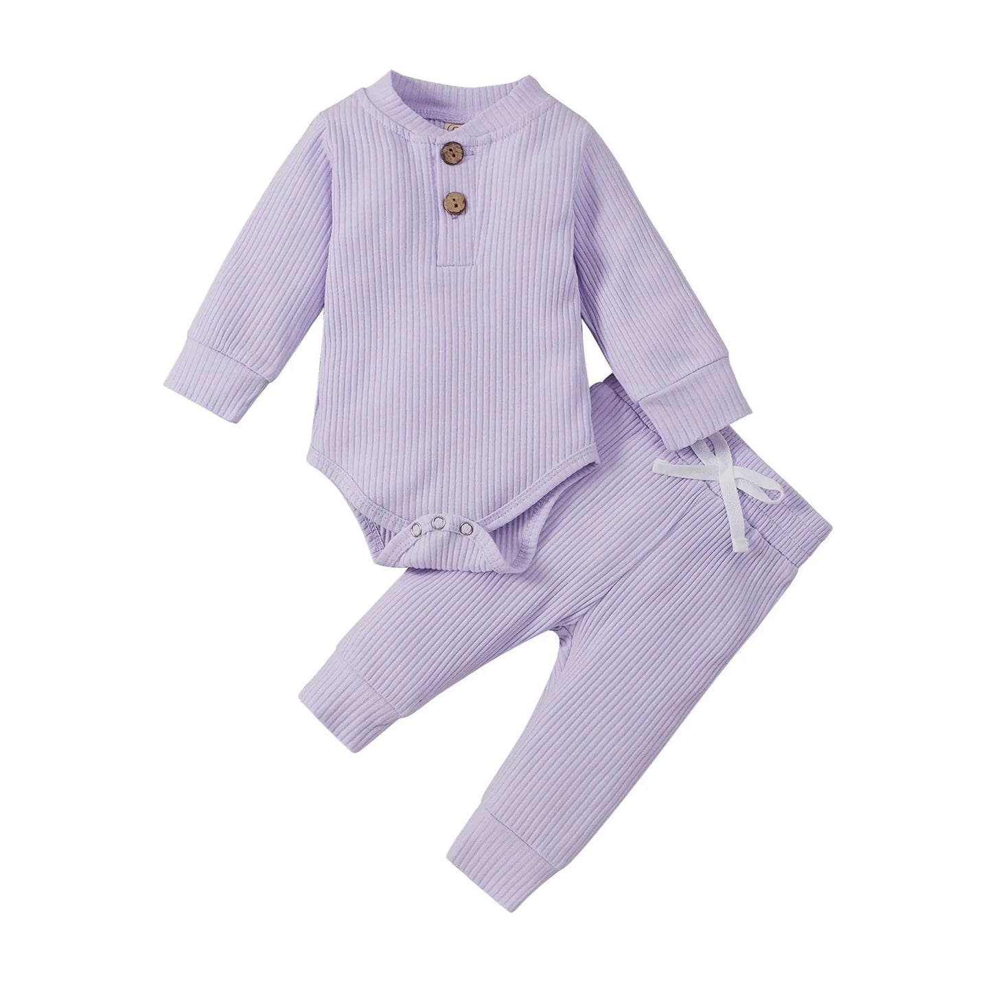 Lavender ribbed cotton long-sleeve baby bodysuit and matching pants with wooden buttons and white bow.