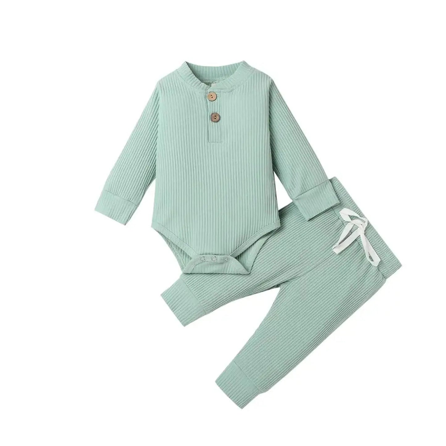 Mint green ribbed cotton baby outfit with long-sleeve bodysuit and matching pants.