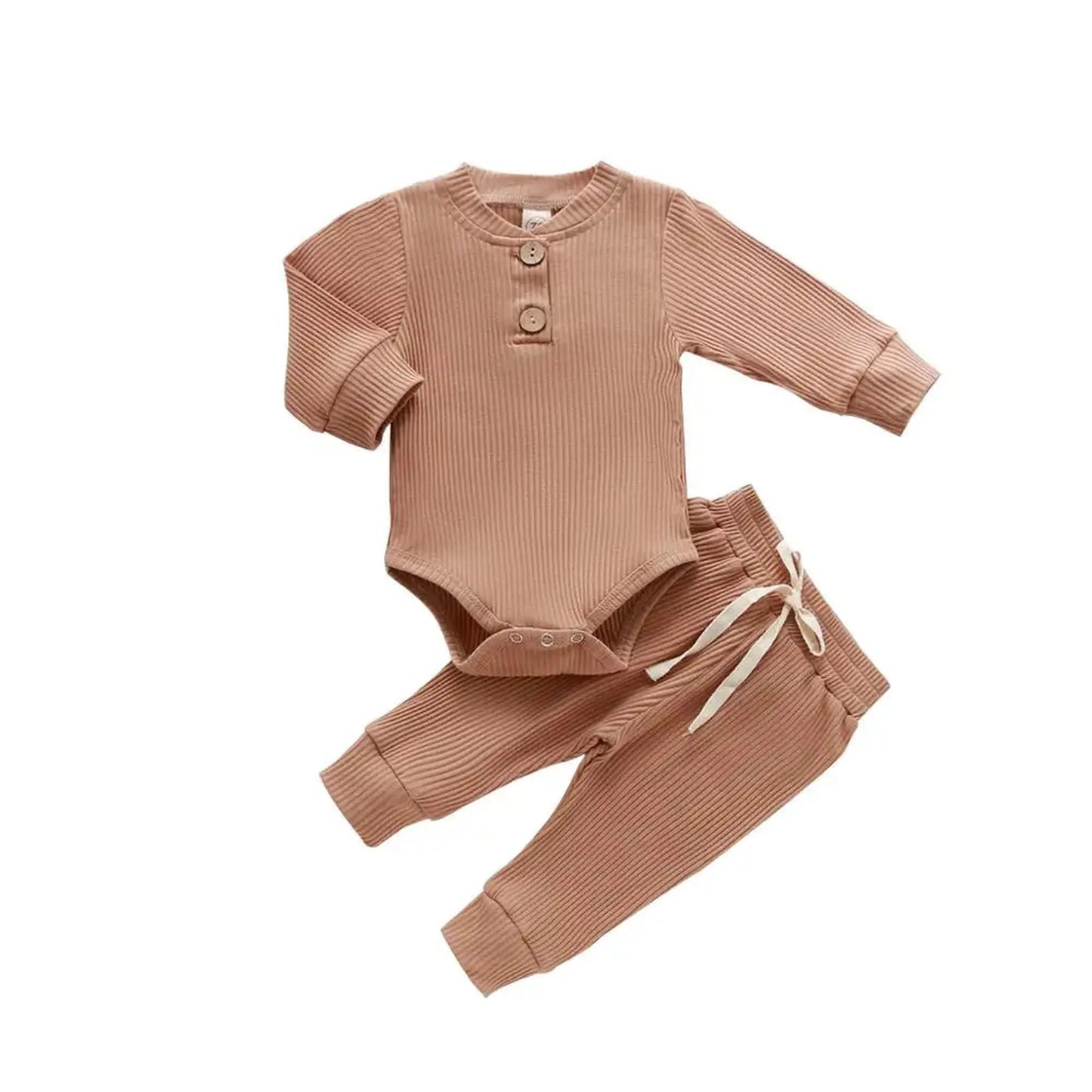 Ribbed long-sleeve baby bodysuit and pants set in dusty rose with wooden buttons and drawstring waist.