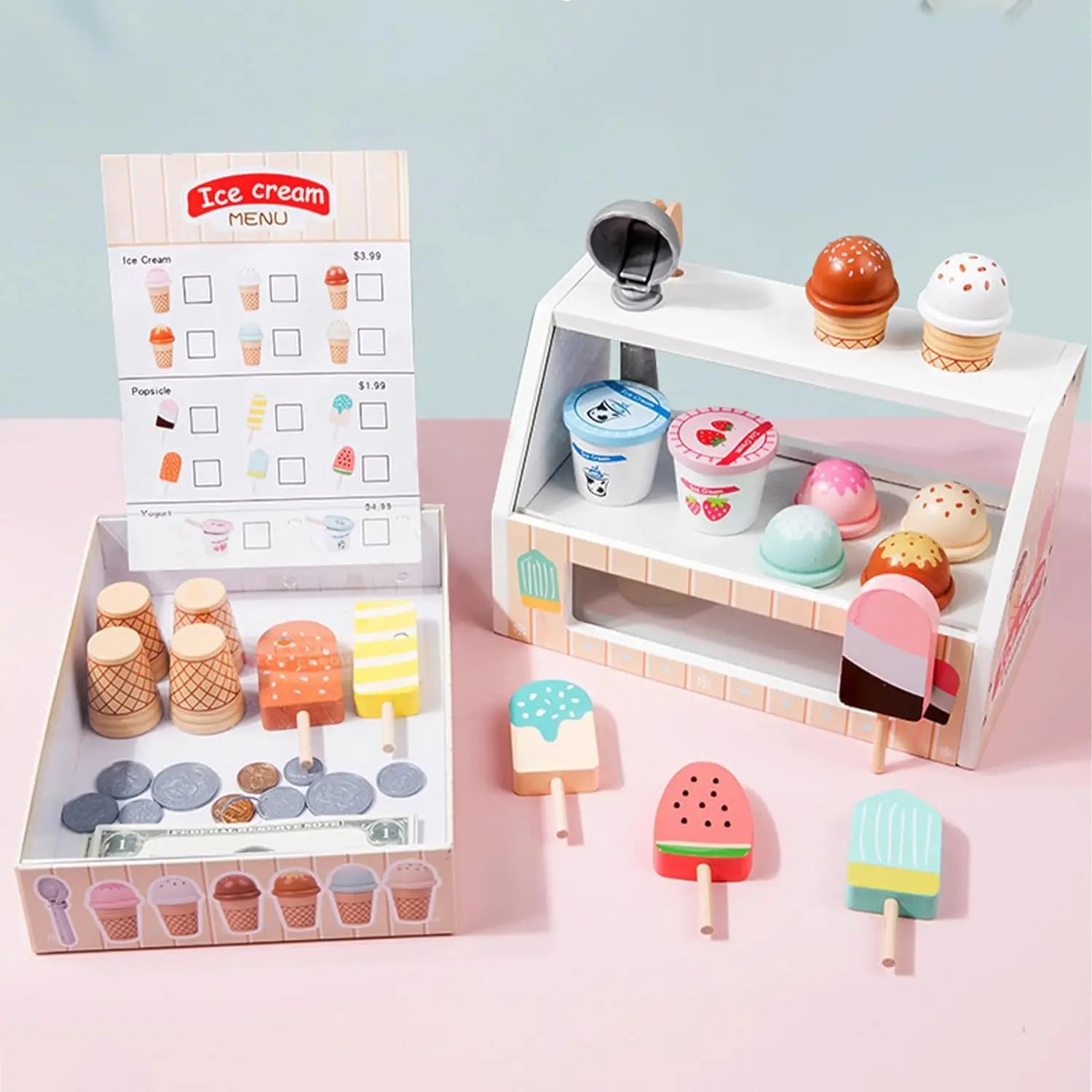 Wooden Montessori ice cream shop playset with colorful popsicles, cones, yogurt cups, menu, and toy money.