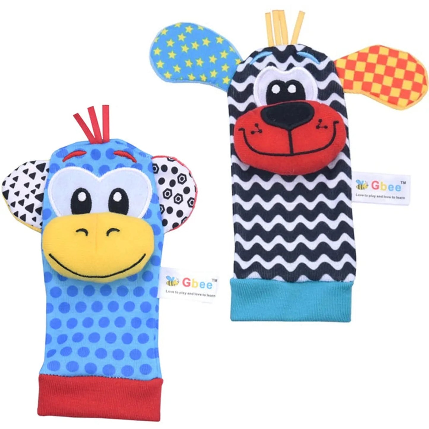 Colorful animal wrist rattles and socks for babies, blue monkey and black-and-white dog designs.