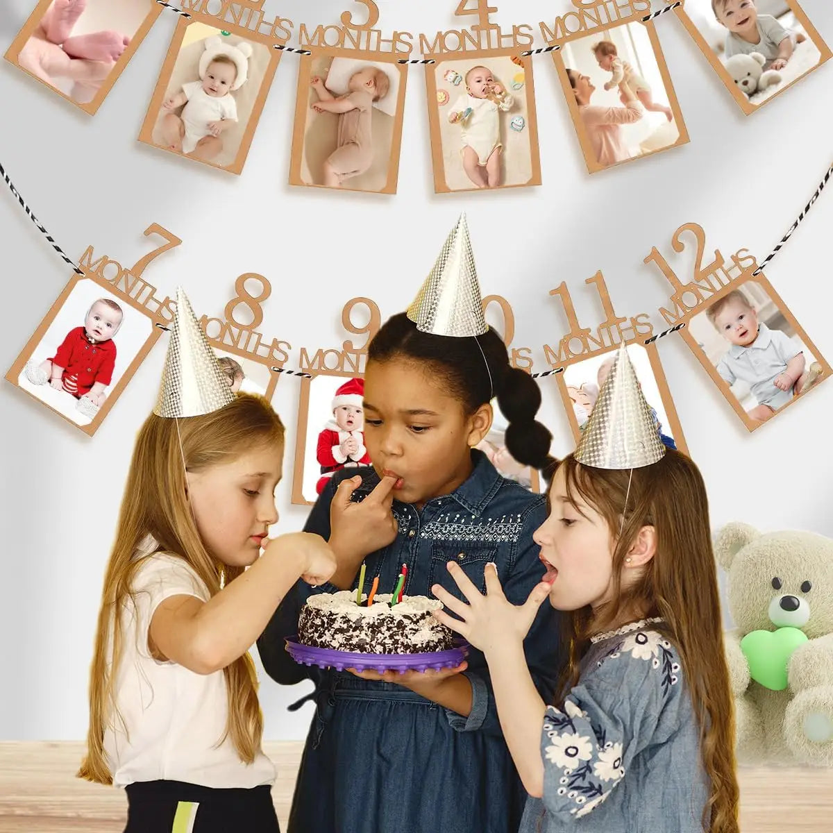 Kids celebrate a birthday with a cake, under a kraft paper banner displaying baby photos for each month.