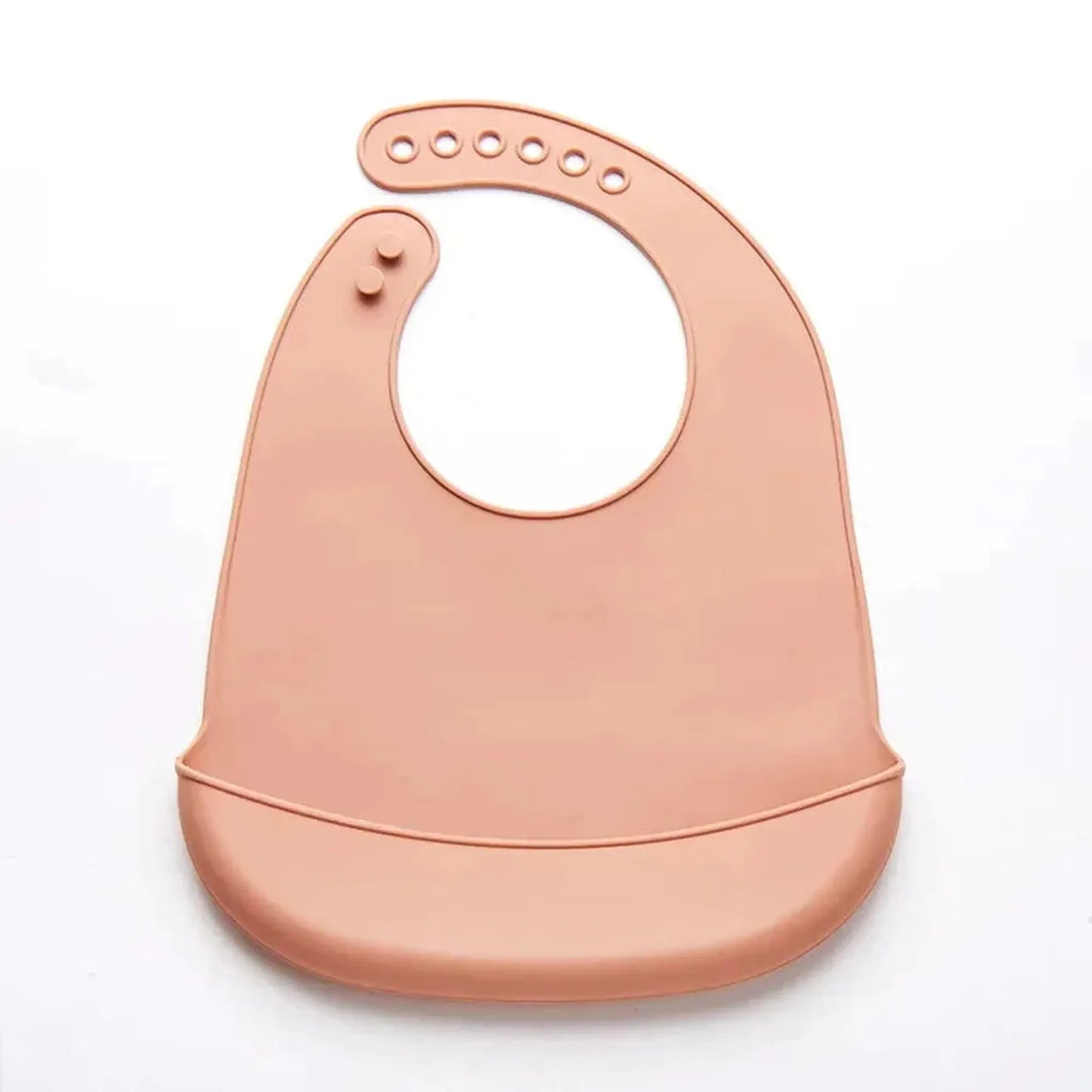 Soft pink waterproof silicone baby bib with adjustable neck closure and food-catching pocket.