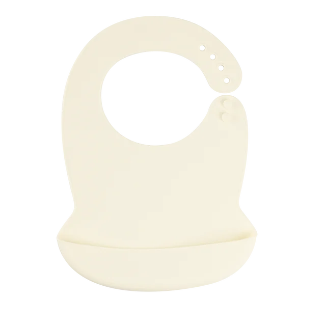 Soft cream silicone baby bib with adjustable neck and deep catch-all pocket.